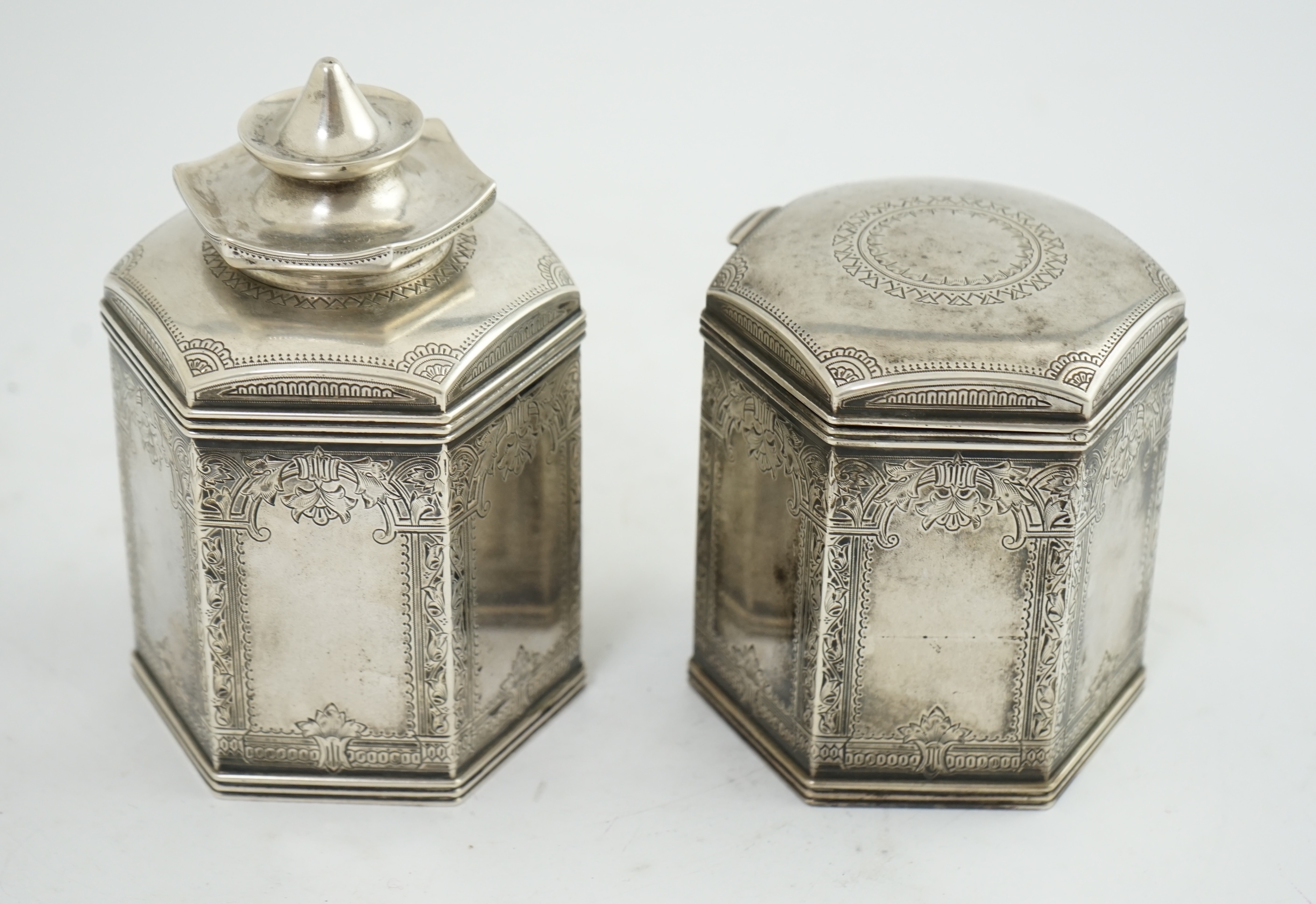 Two similar late 19th/early 20th century Russian 84 zolotnik silver tea caddies, master Varvara Baladanov